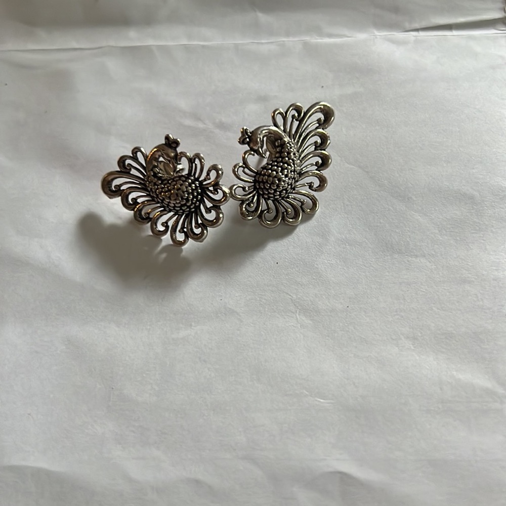 Sterling silver peacock earrings. Pierced earrings. Ornate peacock earrings.